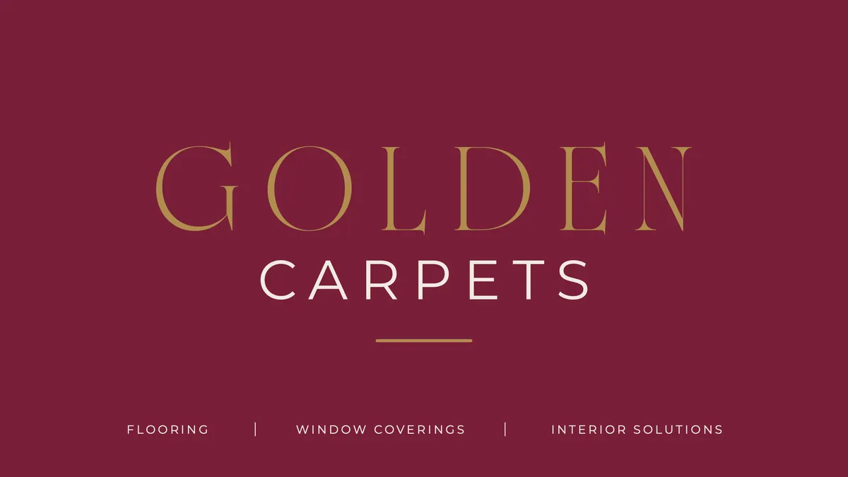 Logotipo de Golden Carpets en dorado y marfil sobre fondo burdeos, con las líneas de negocio: flooring, window coverings e interior solutions.